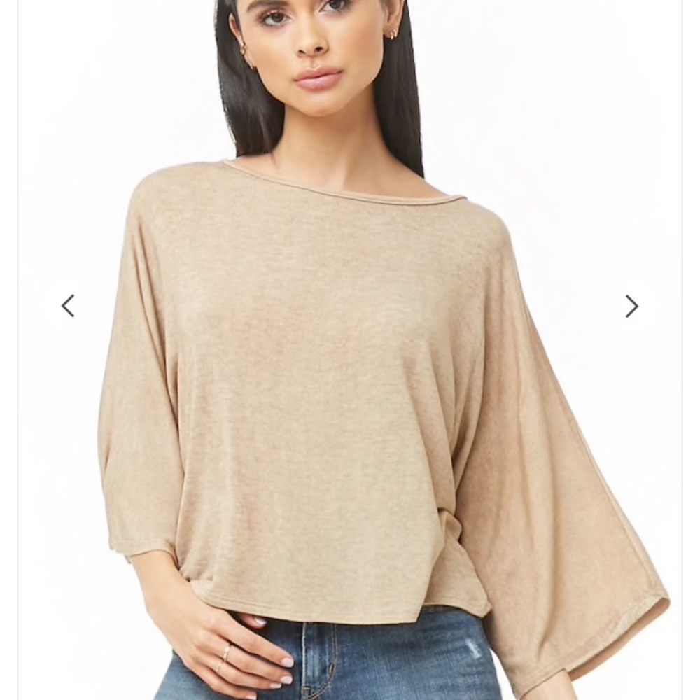 Tan light long sleeve top.